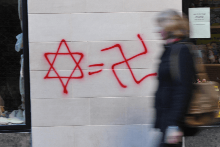 Graffiti of a Jewish Star equal sign swastika