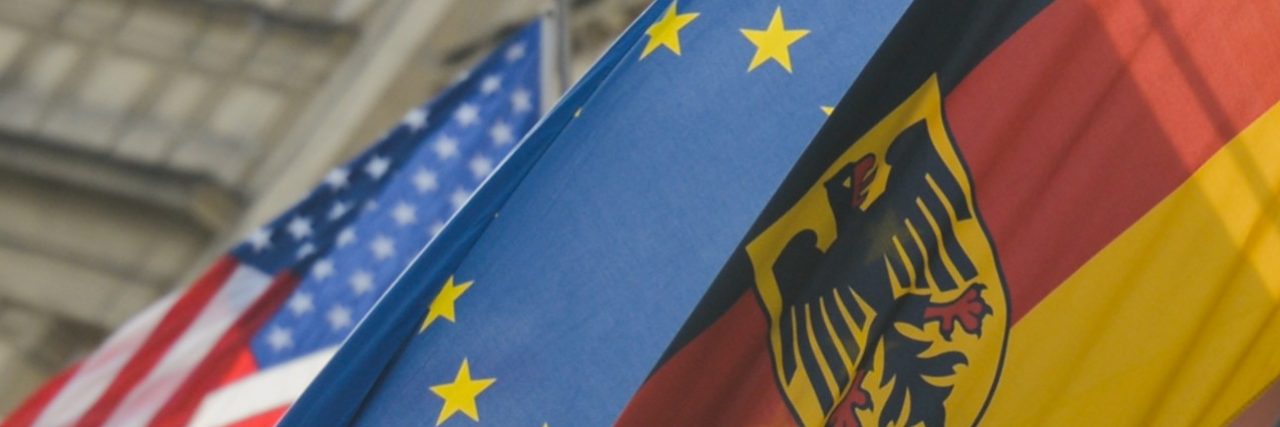 American, EU, and German flags