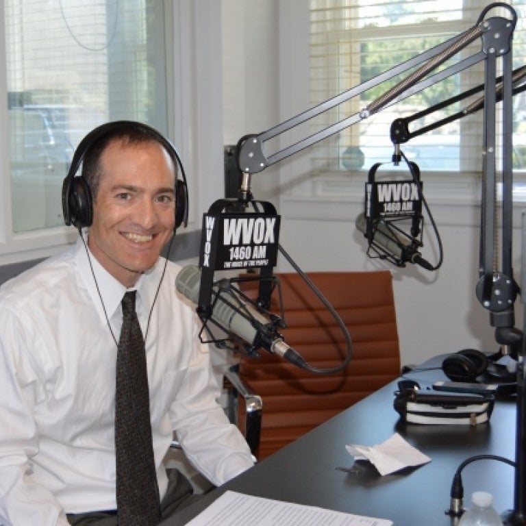 Photo of Scott Richman in the WVOX radio studio