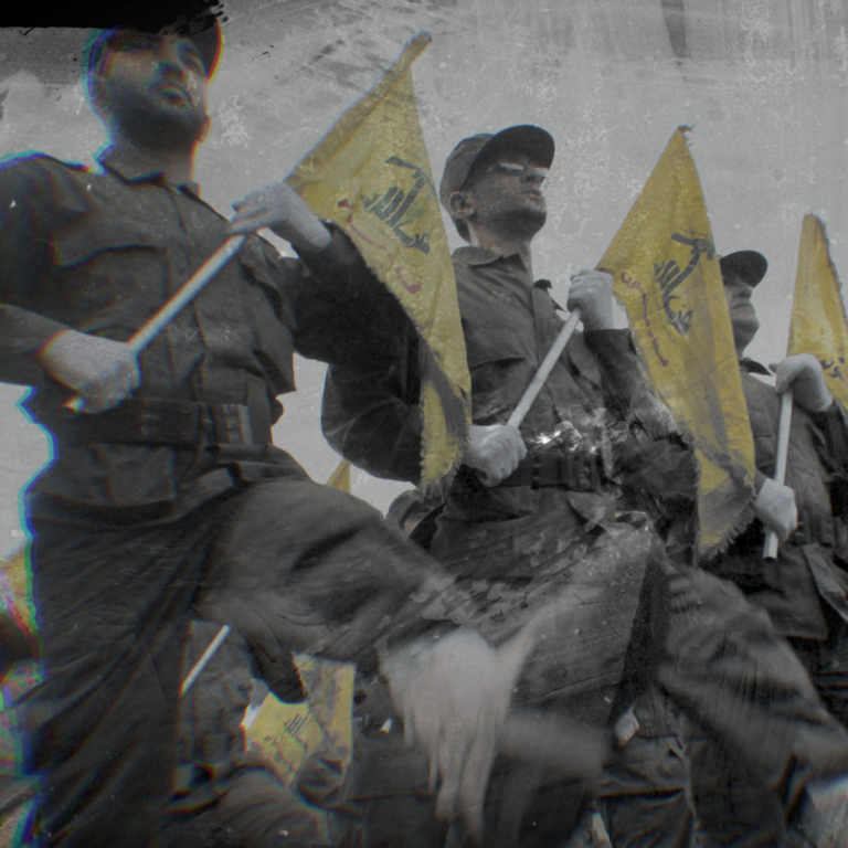 photo of Hezbollah militants marching with flags
