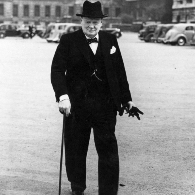 Winston Churchill walking on a street