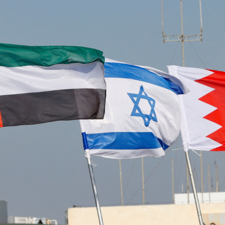 Flags of the Abraham Accords, including Israel, UAE, Bahrain, and United States