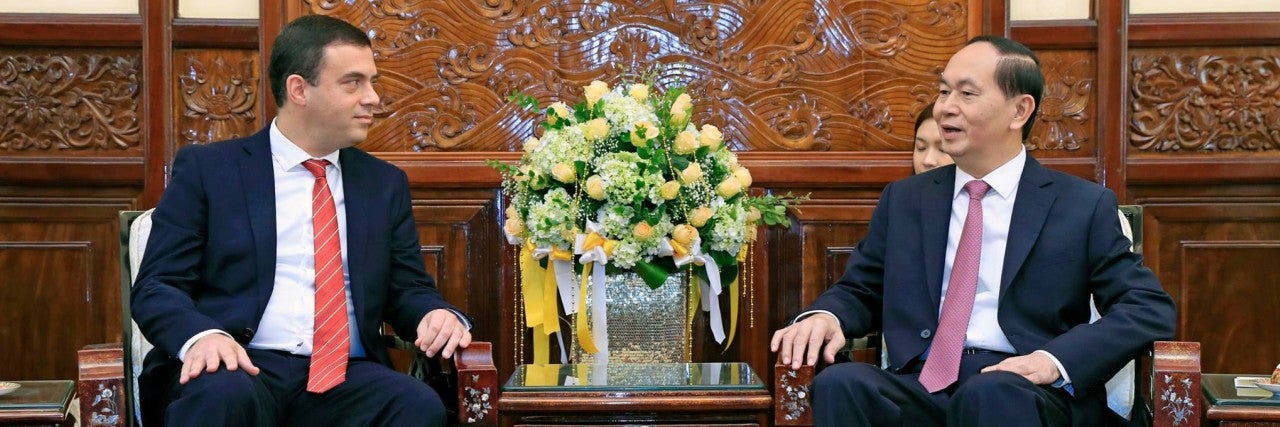 Photo of Amb. Eshcar with Vietnamese President Quang