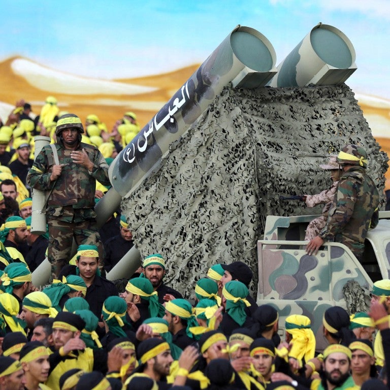 Photo of Hezbollah forces with a mock missile launcher