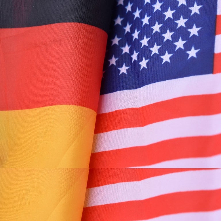 Image of overlapping German and US flags