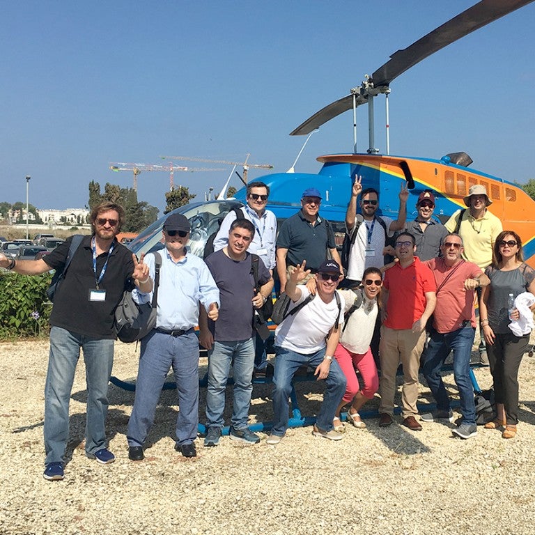 Photo of Project Interchange Alumni going on a helicopter ride