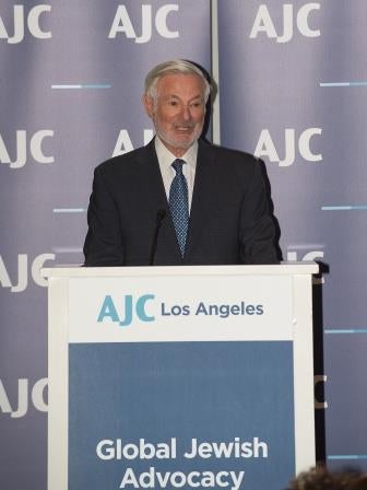 Photo of AJC Past National President Bruce Ramer presenting the Former Israeli Ambassador to Japan, Hideo Sato, with the prestigious Madeline and Bruce Ramer Award for Diplomatic Excellence