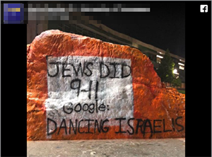 Photo of graffiti saying "Jews did 9-11 Google: Dancing Israelis"
