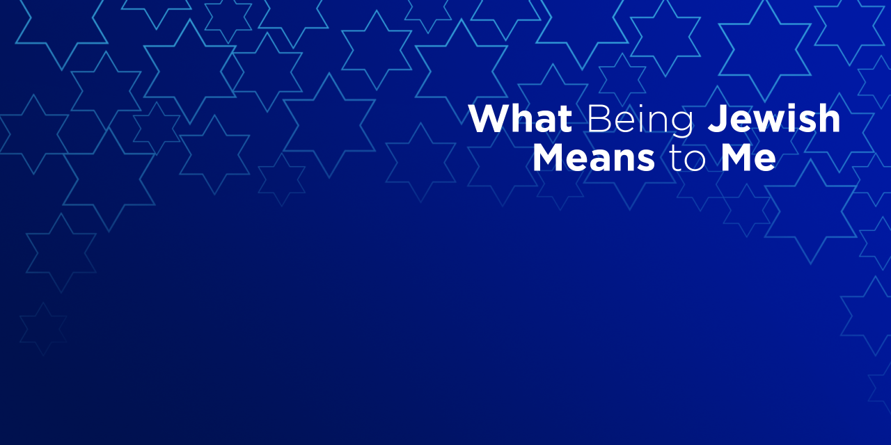 Graphic saying "What Being Jewish Means To Me" on a blue background with stars of David