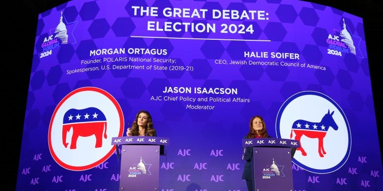 Photo of Morgan Ortagus and Halie Soifer at AJC Global Forum behind podiums for The Great Debate: Election 2024