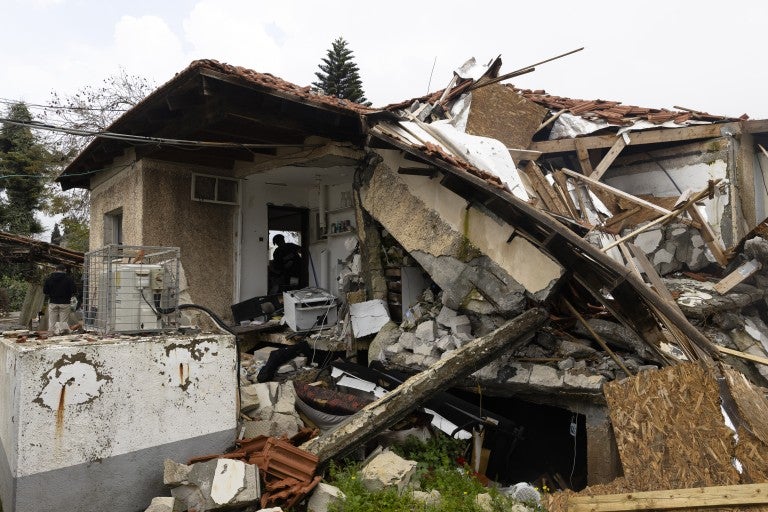 METULA, ISRAEL - MARCH 19: A journalist views a house that was damaged by a rocket fired from Lebanon by Hezbollah during a tour organized for journalists in a northern village on March 19, 2024 in Metula, Israel. Israel and Hezbollah, the Iran-backed militant and political group in Lebanon, have traded near daily strikes in recent months, as the war in Gaza has stoked regional hostilities. 