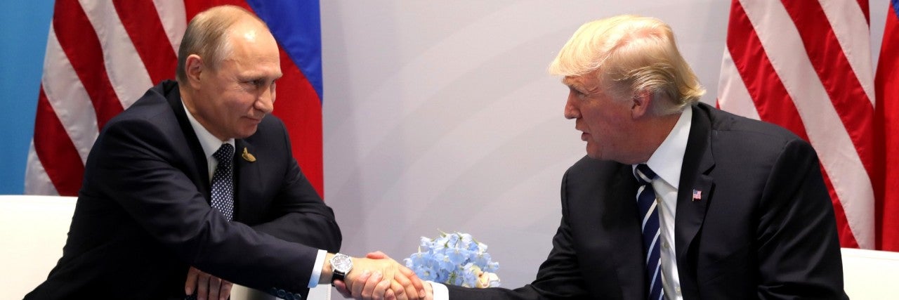 Photo of President Trump and President Putin shaking hands at the G-20 Hamburg Summit