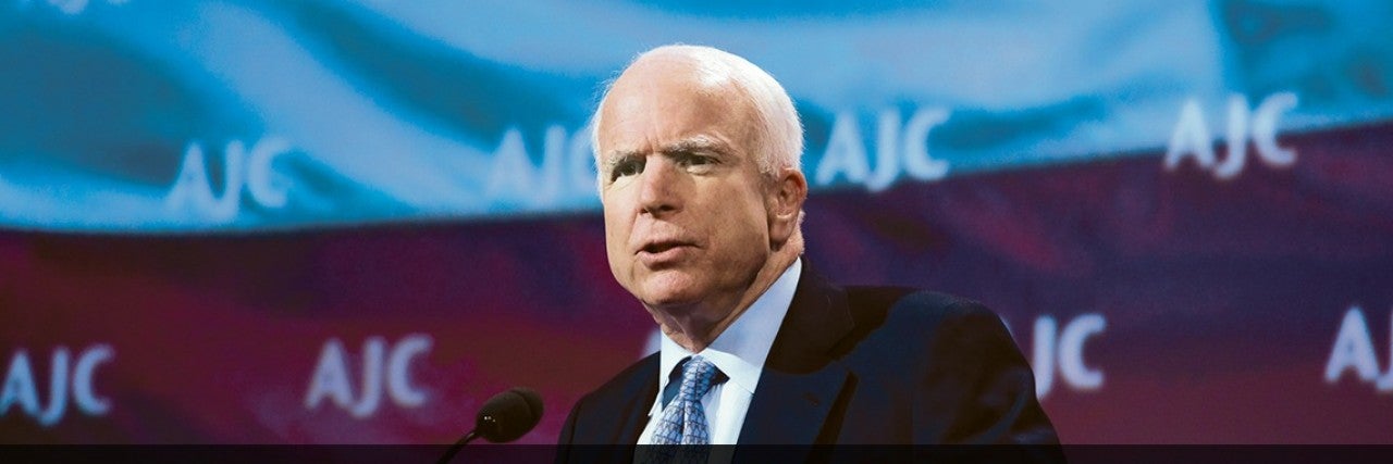Photo of Senator John McCain speaking at AJC Global Forum