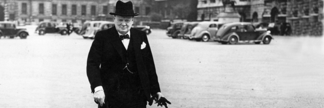 Winston Churchill walking on a street