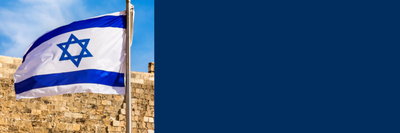 Israeli flag in front of Western Wall