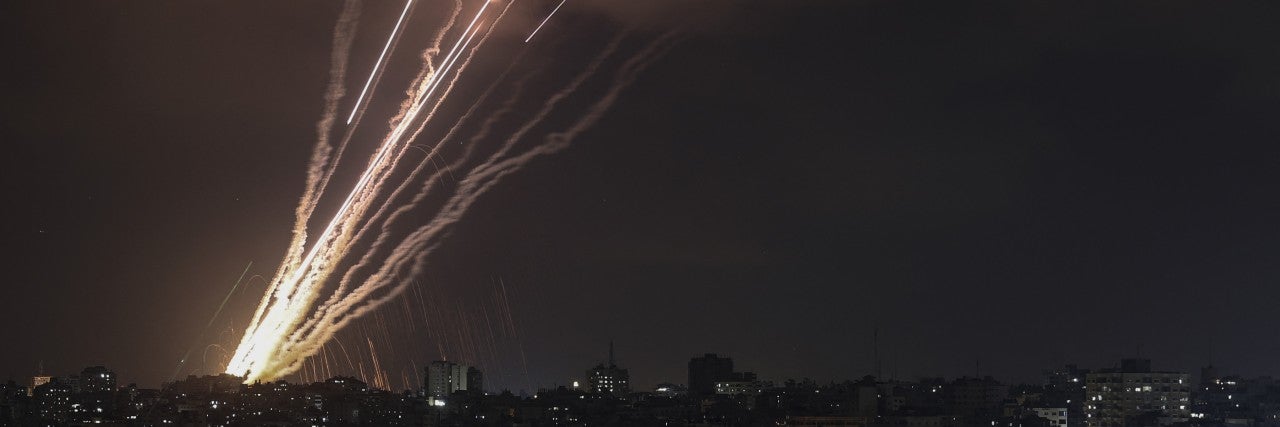  A salvo of rockets is fired from Gaza City toward Israel, on August 6, 2022. Credit: MOHAMMED ABED/AFP via Getty Images