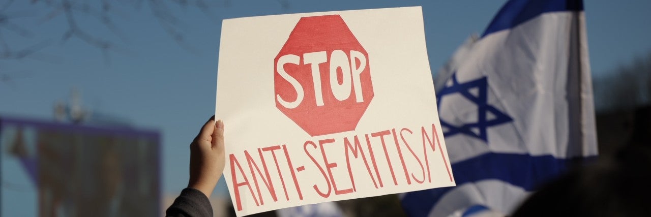 Sign saying Stop Antisemitism