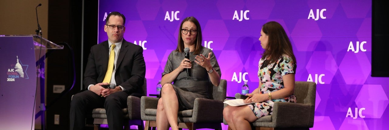 Julie Fishman Rayman, AJC Managing Director, Policy and Political Affairs sitting down with experts at AJC's 2024 Global Forum.
