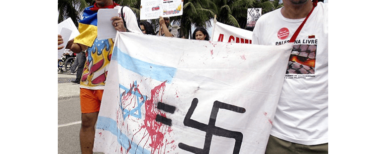 Photo of an Israeli flag, an equals sign, and a swastika with red paint to look like blood