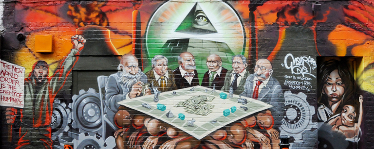 Graffiti artist Mear One’s “Freedom for Humanity” mural depicting white male capitalists, several who are Jewish (see Jewish features) as the enemy of the good.