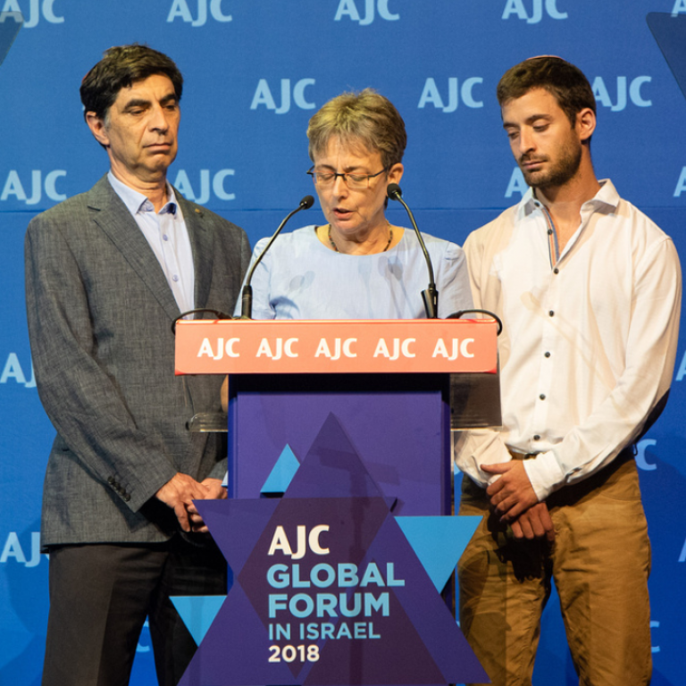 Photo of Leah, Simcha, Tzur Goldin speaking at AJC Global Forum 2018