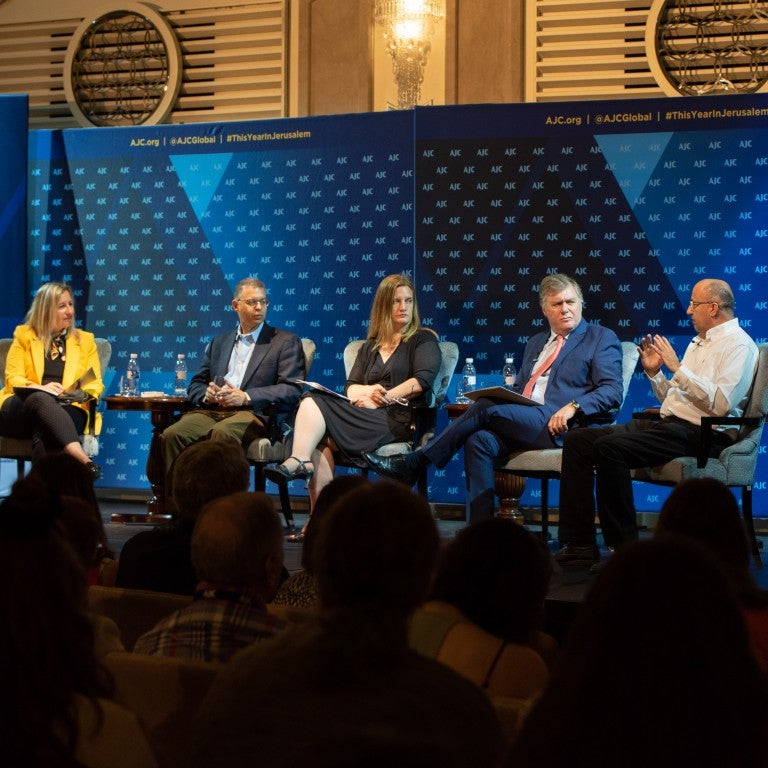 Photo of a panel of four leading journalists from around the world, moderated by AJC Jerusalem Director Avital Leibovich at AJC Global Forum 2018