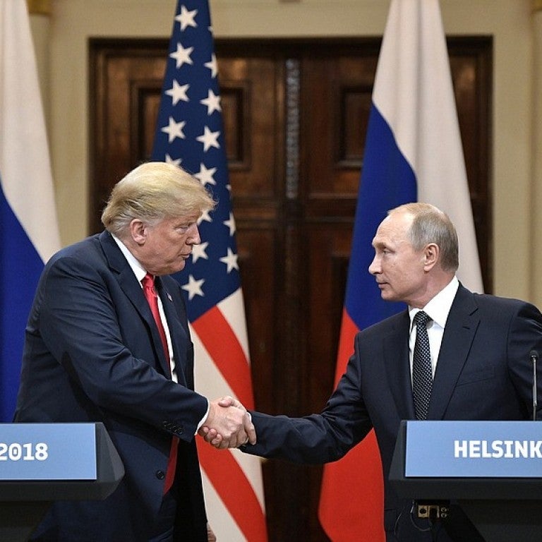 Photo of President Trump Shaking President Putin's Hand