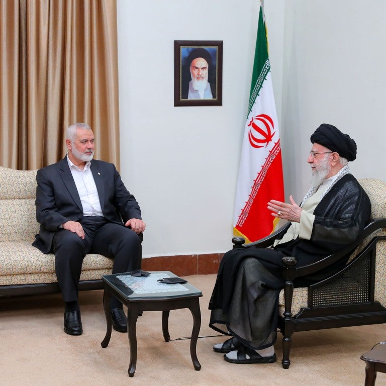 Ali Khamenei, the Supreme Leader of Iran (R), meets with Ismail Haniyeh (C), head of the political bureau of Hamas, and Ziyad al-Nakhalah, the Secretary General of the Palestinian Islamic Jihad Movement before noon on July 30, 2024. on July 30, 2024 in Tehran, Iran. Haniyeh, who lived in Qatar, was visiting Tehran this week for the new Iranian president's inauguration.