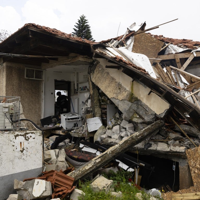 METULA, ISRAEL - MARCH 19: A journalist views a house that was damaged by a rocket fired from Lebanon by Hezbollah during a tour organized for journalists in a northern village on March 19, 2024 in Metula, Israel. Israel and Hezbollah, the Iran-backed militant and political group in Lebanon, have traded near daily strikes in recent months, as the war in Gaza has stoked regional hostilities. 